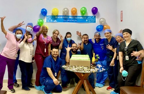 A team of volunteers celebrate